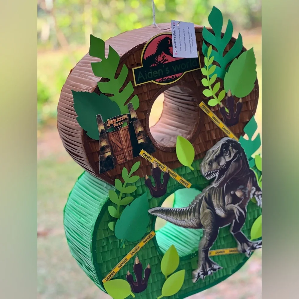 Dinosaur-Themed Party Decoration with Green and Brown Accents